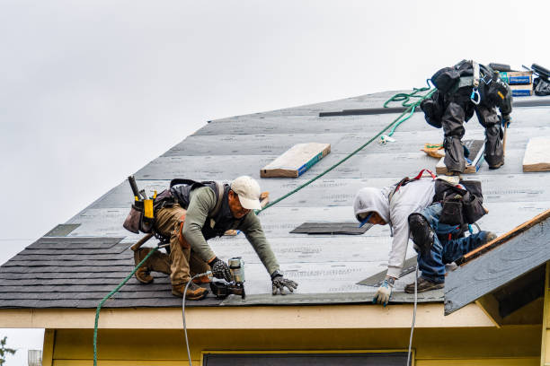 Professional Roofing technician working in Murrieta, CA